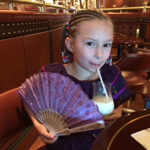 Hanging out in the Explorers Lounge. The Girl loved her fan and dress from Costa Maya. Purple, of course. Oh, and she became quite the fan of virgin pina coladas.