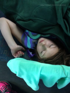 The Girl was wiped out from our gallavanting, and fell asleep on the bus back from the swamp.